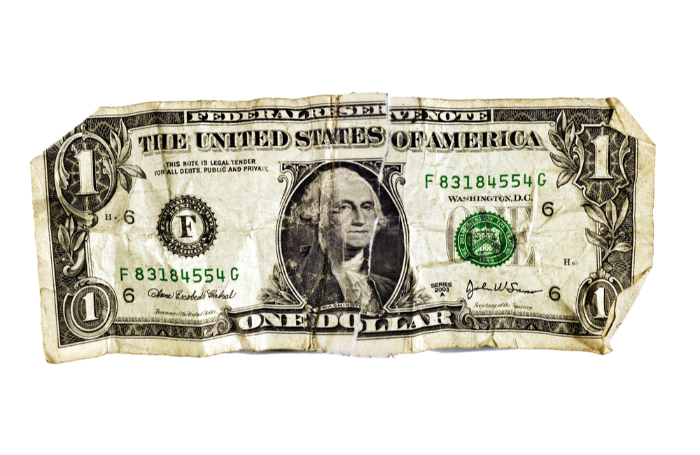 The Race You Can't Win: Battered dollar bill