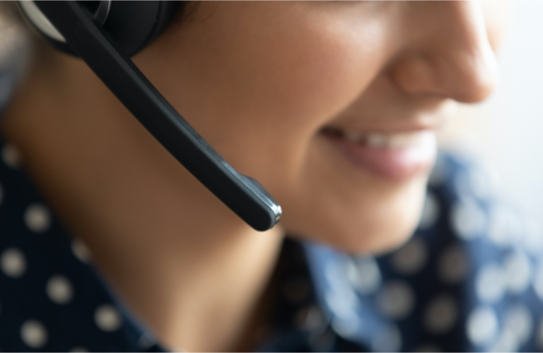 How Lively Demonstrates Customer Experience is Queen: Customer service rep listening on headset