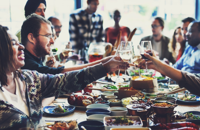 Photo of people sharing a meal to highlight gratitude