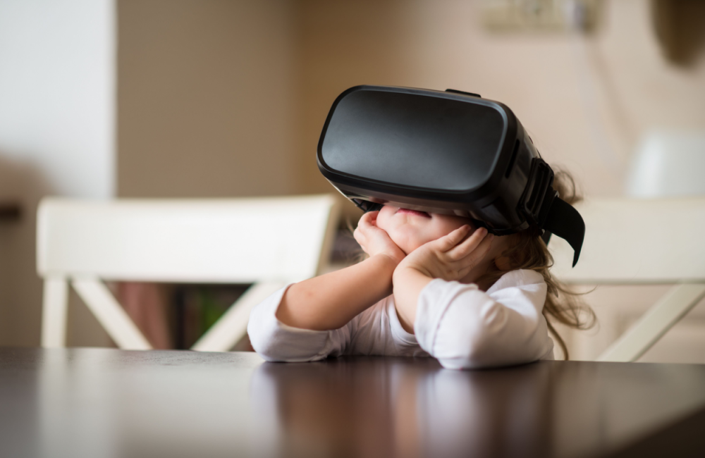 Photo of child wearing a virtual reality headset to illustrate the idea that the future is already here