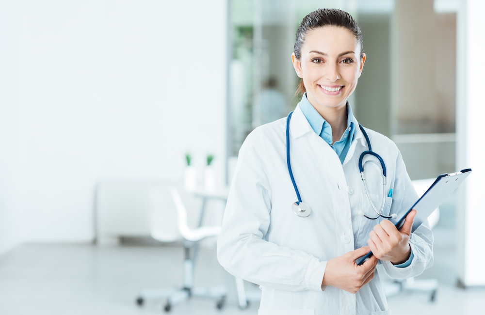 Photograph of smiling woman doctor to illustrate the idea of a health check for your business
