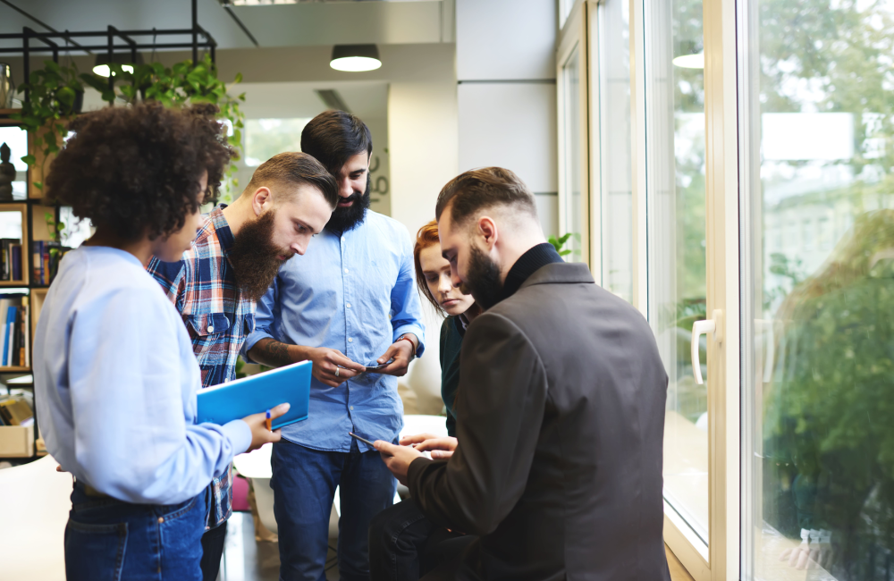 Team collaborating on what artificial intelligence will do to content marketing